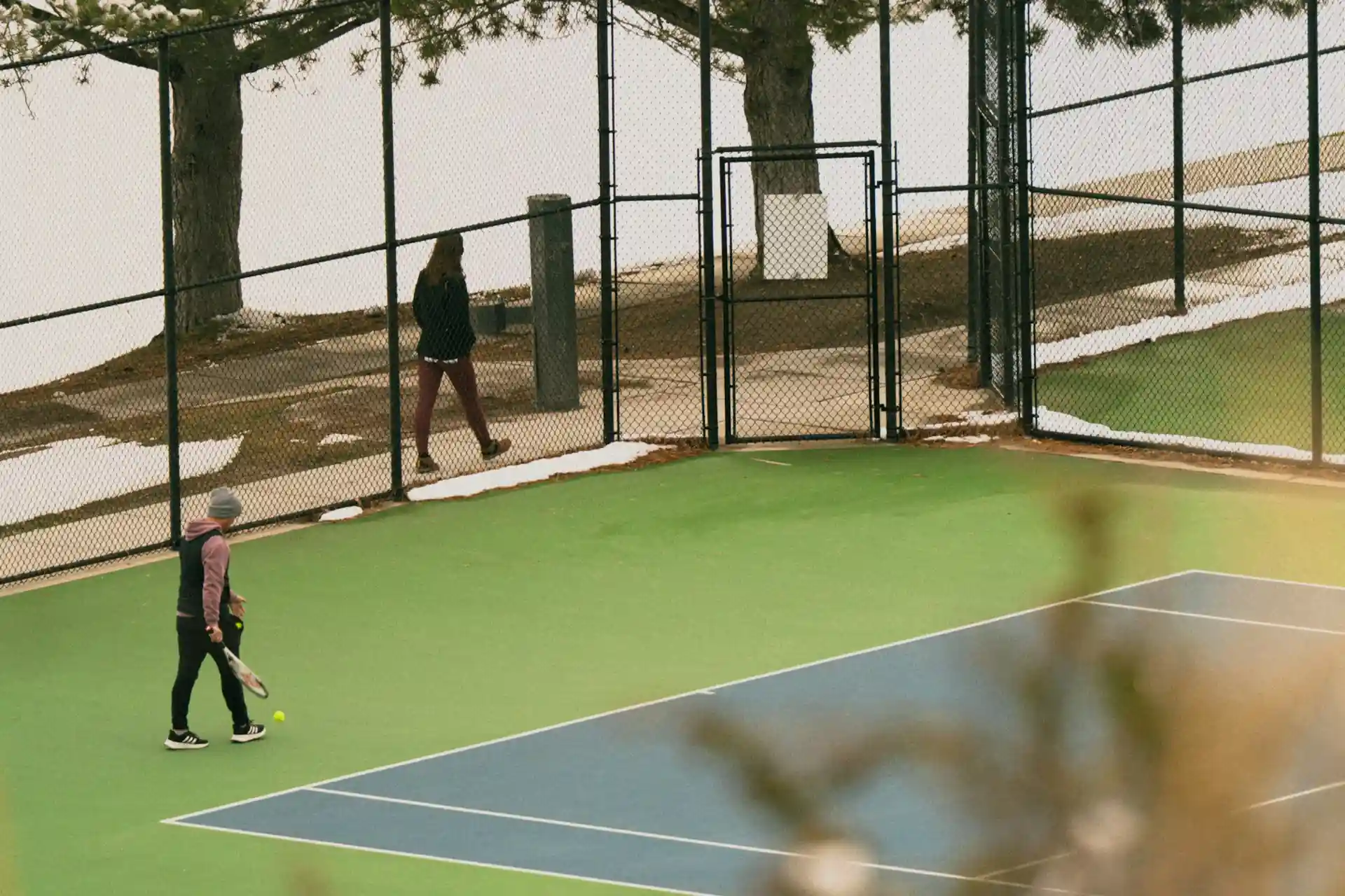 Best Tennis Coaches in New York City giving on-court instruction