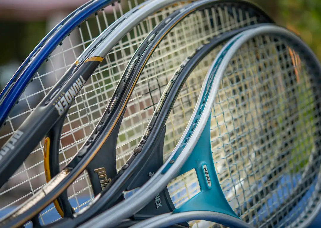 Inside a tennis pro shop in Houston with rackets on display