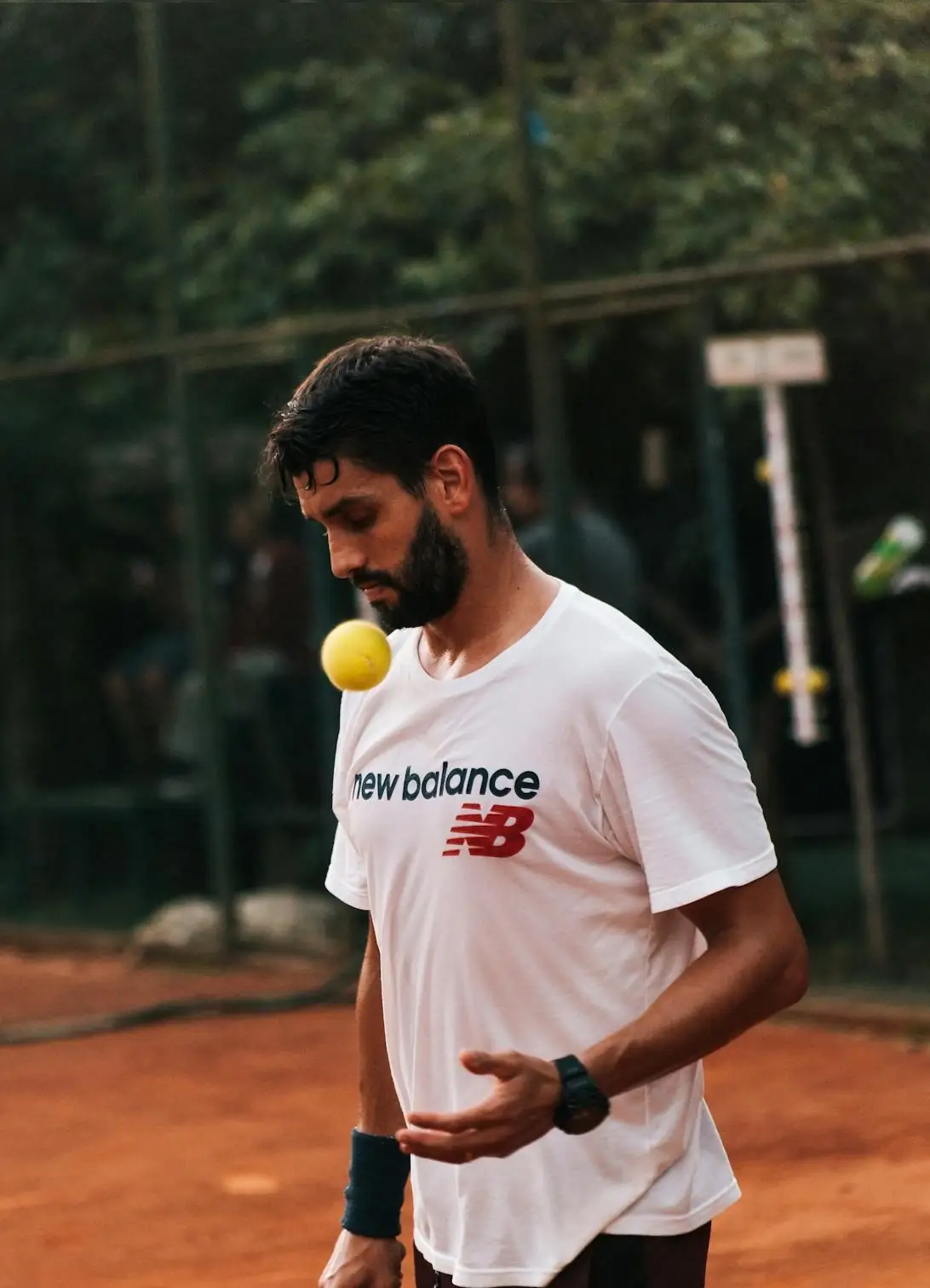 Male tennis coach during a private mobile tennis lesson in Atlanta, GA.