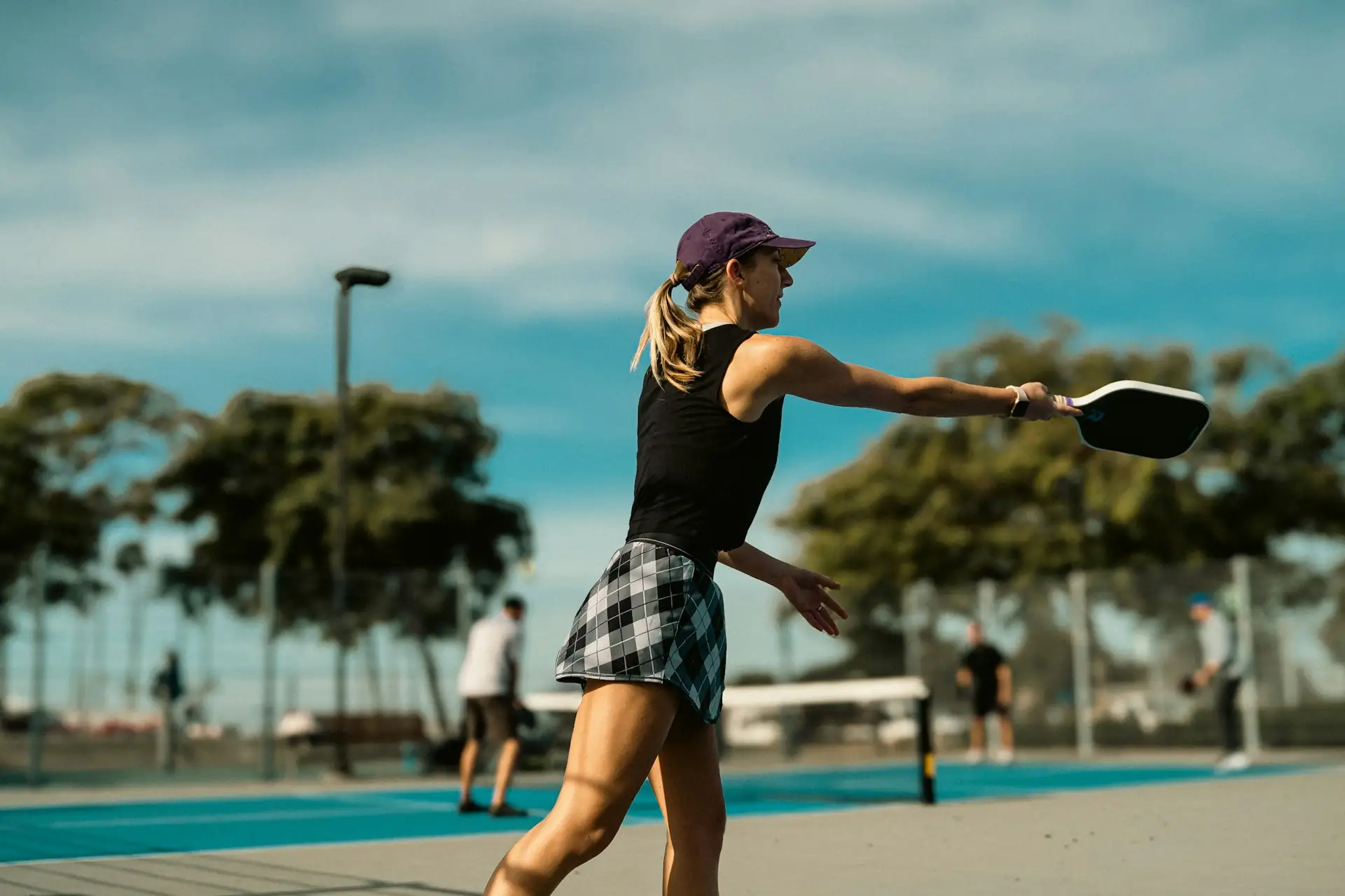 Woman doing pickleball drills during a one-on-one lesson