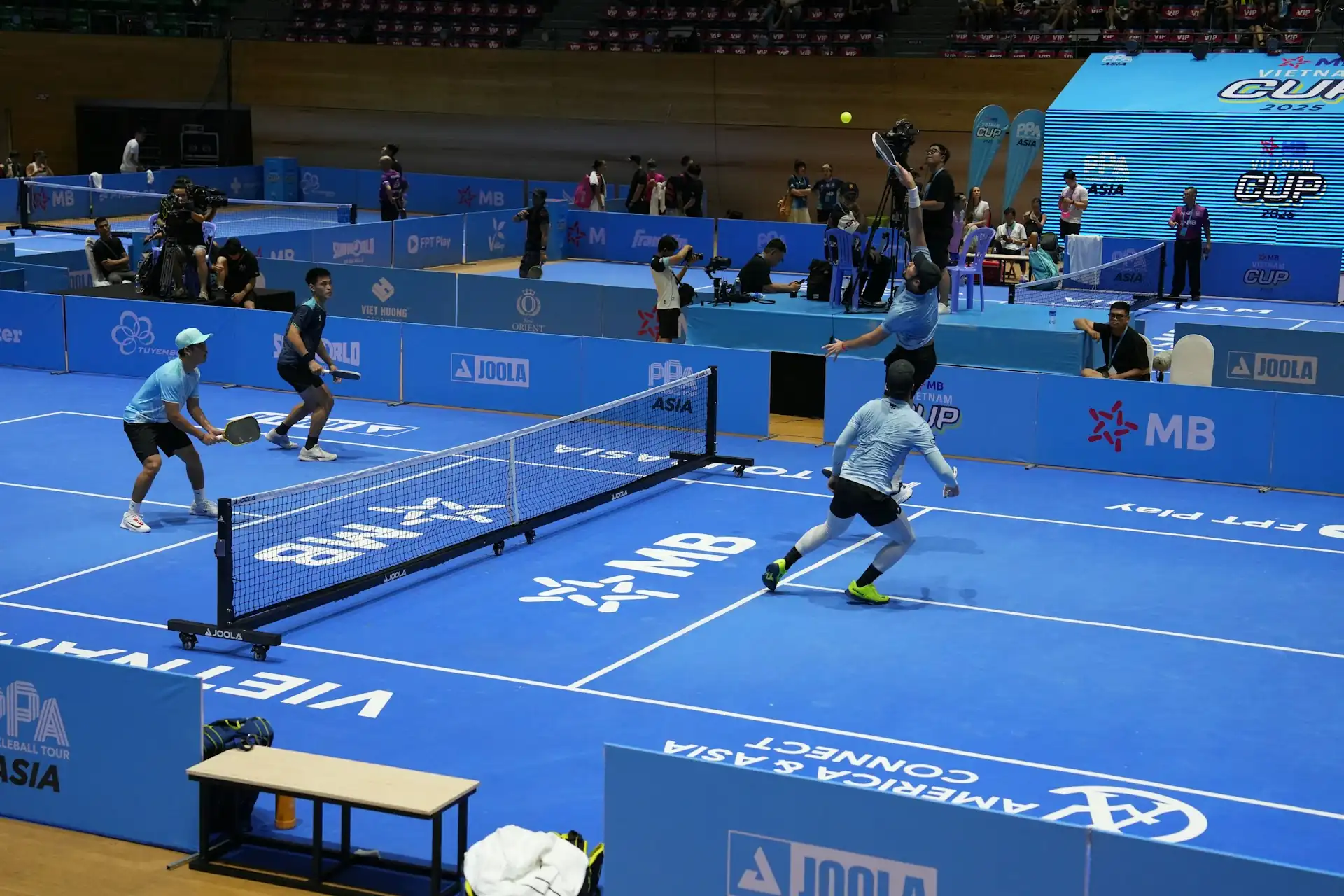 Competitive pickleball match during an ALTA league night in Atlanta
