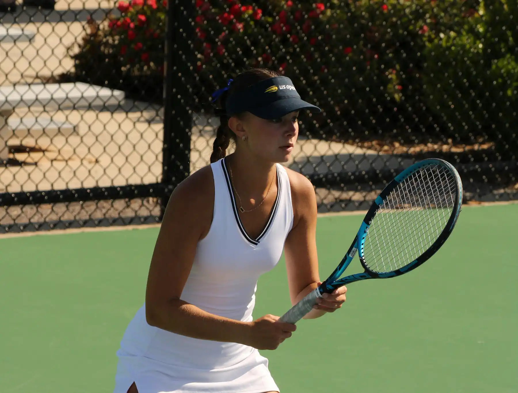 Female tennis coach teaching a private lesson in Phoenix, AZ.