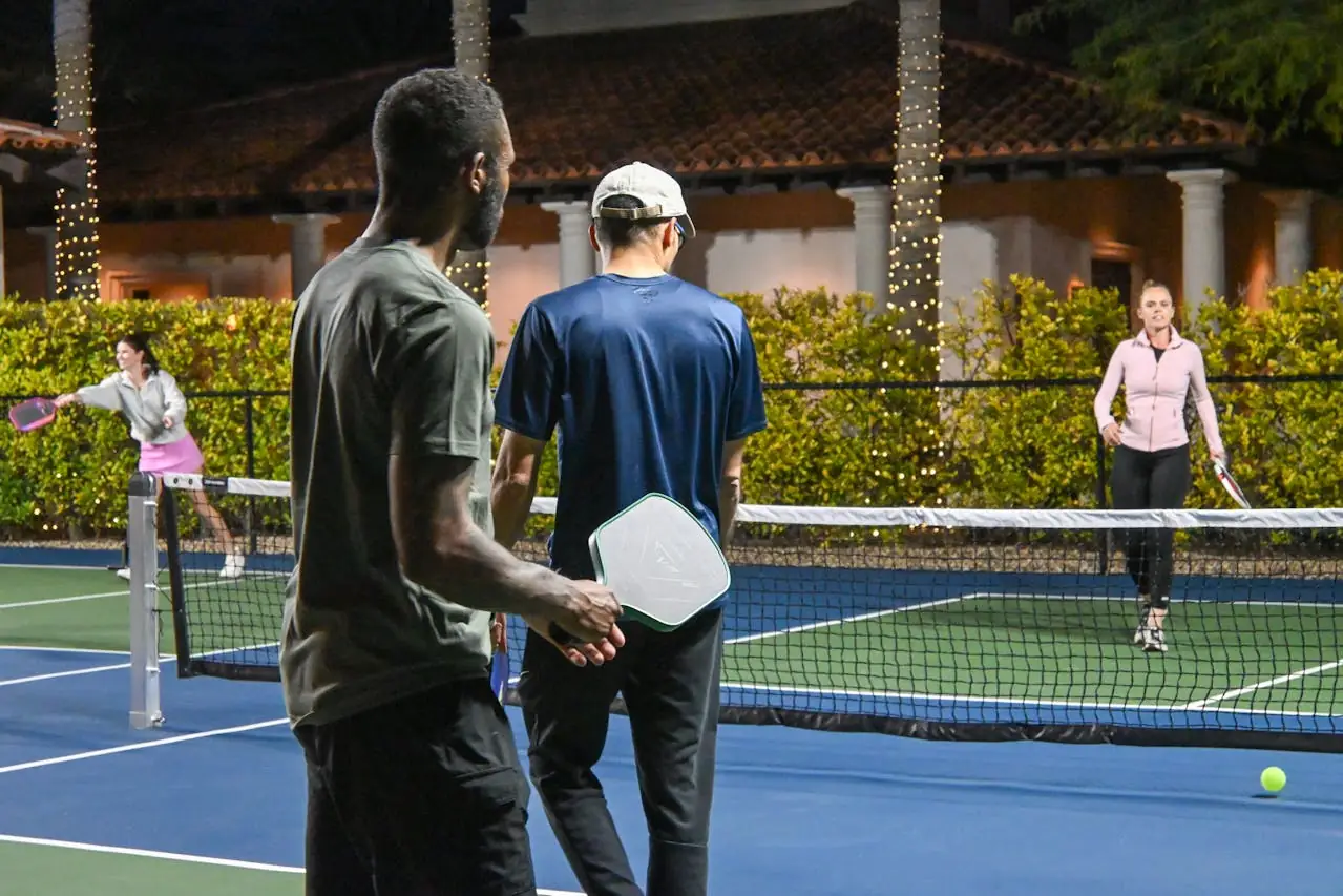Group of players receiving private pickleball coaching at an Alpharetta court